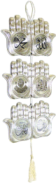 Pendentif argenté " 2 mains " contenant : le nom d'allah , mouhamed ,al-chahada ,et les troix sourates Qoul. Pendentif argente " 2 mains " contenant : le nom d'allah , mouhamed ,al-chahada ,et les troix sourates Qoul.