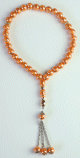 Chapelet "Sebha" de luxe à 33 perles de couleur saumon Chapelet "Sebha" de luxe a 33 perles de couleur saumon