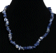 Collier ethnique artisanal imitation quartz bleu avec un pendentif en quartz